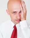 Weary businessman over grey background