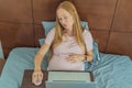Weary pregnant woman, tired of working from home, navigates the challenges of balancing professional tasks with Royalty Free Stock Photo
