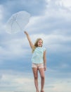 Weather changing. Fresh air. Girl with umbrella cloudy sky background. Freedom and freshness. Anti gravity concept
