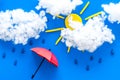 Weather forecast concept. Sunny and rainy. blue background top view Royalty Free Stock Photo