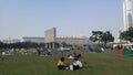 Shenzhen, China: it`s sunny and warm. Citizens relax on the park lawn, some set up tents, and the family is enjoying their leisure