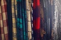 The weather might be cold, your style shouldnt be. Closeup shot of scarfs hanging in a store.
