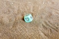 Weather prediction. Blu cube with heart and weather symbols. Funny gambling dice on sand. Saint Valentines concept. Love