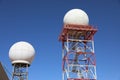 Weather Radar towers Meteorological station on blue sky Royalty Free Stock Photo