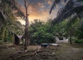 Weather scene around an old rural deserted semi-concrete home.