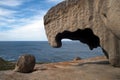 Weather sculpted granite boulder at Remarkable Rocks with horizon over Southern Ocean in background