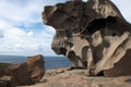 Weather sculpted granite boulder at Remarkable Rocks with horizon over Southern Ocean in background