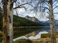 Weather trees help frame the Idaho Sawtooths at Stanley Lake Royalty Free Stock Photo