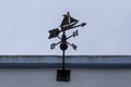 Weather vane with boat