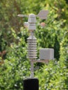 Weather vane marking the direction of the wind and anemometer (wind speed meter) Royalty Free Stock Photo