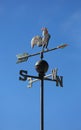 Weather vane to indicate the wind direction with a rooster in wr