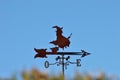 Weather vane with a witch flying with broom