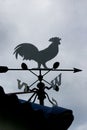 Weathercock compass arrow on the roof