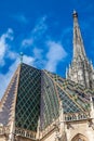 The weathercock and roof of the beautiful antique Saint Stephen Cathedral built on 1160 located at Stephansplatz in Vienna Royalty Free Stock Photo