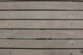 Weatherd wood lath line arrange pattern textrue background.Texture of dark untreated wood Royalty Free Stock Photo