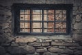 Weathered Abandoned Building Exterior with Damaged Walls and Old Windows. Place of imprisonment, Prison with the old window Royalty Free Stock Photo
