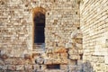 Weathered ancient Rhodes fortress stone brick wall