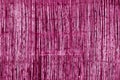 Weathered bamboo fence in pink tone