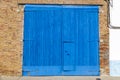 Weathered blue warehouse door