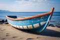 an weathered blue and white colored boat on a sandy beacht