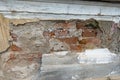 Weathered brick wall close up shot on old abandoned building Royalty Free Stock Photo