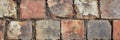 Weathered brick wall texture with rustic red and gray stone pattern background Royalty Free Stock Photo