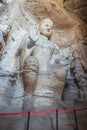 Weathered Buddha statue in cave 3 of the Yungang Grottoes Royalty Free Stock Photo