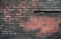 Weathered burnt brick wall with tones shows an aged, rustic texture Royalty Free Stock Photo