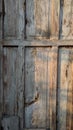 Weathered damaged wooden door texture background