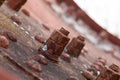 weathered detail of iron construction with bolts and nuts Royalty Free Stock Photo