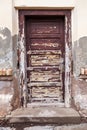 Weathered door with peeling paint Royalty Free Stock Photo