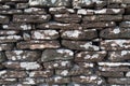 Weathered dry stone wall background Royalty Free Stock Photo