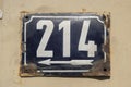 Weathered enameled plate number 214