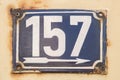 Weathered enameled plate number 157 Royalty Free Stock Photo