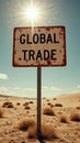 Weathered global trade sign in arid desert landscape under bright sunlight Royalty Free Stock Photo