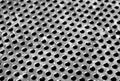 Weathered gray metal surface with holes and blur effect Royalty Free Stock Photo