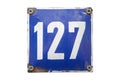 Metal enameled plate of number 127