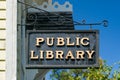 Weathered Hanging Public Library Sign