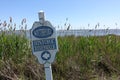 Weathered Historic Riverwalk Entrance Sign in Southport, NC Royalty Free Stock Photo