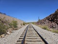 Weathered historical train tracks outside of Boulder City, Nevada, USA Royalty Free Stock Photo