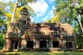 Weathered legacy: An old abandoned Khmer building standing in the Cambodian forest, a cherished monument of medieval Asian Royalty Free Stock Photo