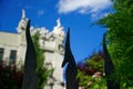 Weathered metal post finials Trident metal fence for protection against chimeras and evil power. Royalty Free Stock Photo