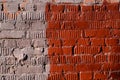 Weathered old brick wall painted brown paint. Abstract background Royalty Free Stock Photo