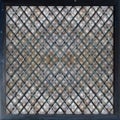 Antique weathered grey door panel, abstract diamond pattern with black frame Royalty Free Stock Photo