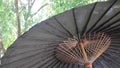 Weathered outdoor umbrella in the garden