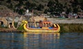 Weathered reed boats along the coast of Lake Titicaca in Puno, P