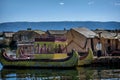 Weathered reed boats along the coast of Lake Titicaca in Puno, P