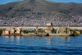 Weathered reed boats along the coast of Lake Titicaca in Puno, P