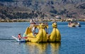 Weathered reed boats along the coast of Lake Titicaca in Puno, P