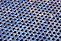 Weathered rusty metal surface with holes and blur effect Royalty Free Stock Photo